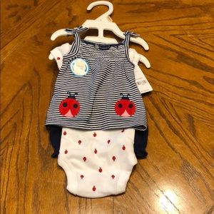 NWT preemie carter’s outfit.